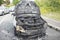 Burnt Out Car On Wath Road Roundabout A6195 Dearne Valley Parkway, Wombwell, Barnsley, South Yorkshire 2pm 9th September 2018