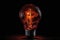a burnt-out lightbulb with a dramatic spotlight effect