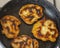 Burnt pancakes in a frying pan