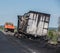 Burnt truck on the side of highway