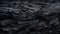 Burnt wood texture background, black charcoal close-up. Abstract charred timber, pattern of dark scorched tree. Concept of smoke,