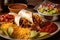 burrito and nachos platter with sizzling fajita meat, spicy salsa, and melted cheese