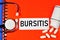 Bursitis-an inscription of the text of the medical diagnosis on a form in a folder.