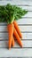 A burst of freshness orange carrot on a clean wooden surface