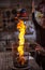 Bursting fire from a gas burner from a gas cylinder