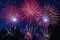 Bursting fireworks against a dark sky, Independence Day celebrations, wallpaper background