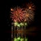 Bursts of Red, Orange and Green Fireworks