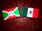 Burundi flag with Mexican flag on a tree stump isolated