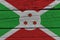 Burundi flag painted on old wood plank