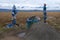 Buryat shaman site with totems and bull stone