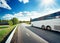 Bus on asphalt road in beautiful spring day