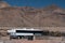 A bus carrying immigrants arrives at the US Border Patrol Station, El Paso Texas, temporary housing / processing area