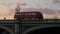 Bus crosses Westminster Bridge at sunset