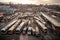 bus depot, with view of the bustling city that it serves, in high-angle shot