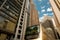 Bus at Des Voeux Road and skyline of buildings  at Central District, Hong Kong