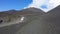 Bus getting tourists on the summit of Etna volcano 