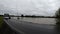 Bus passing a flooded field