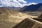 Bus on a road high on the Tibetan Plateau