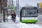 bus, standing near the bus stop and passengers