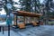 Bus stop in Banff Avenue in autumn and winter snowy season.