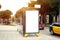 Bus stop with vertical empty billboard placeholder, information banner template, space for mockup layout.