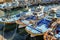 Busan, South Korea, 01/03/2018. Multicolored fishing boats in the port next to the fish market. Close-up