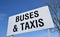 Buses and taxis sign.