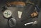 Bushcraft starting equipment. EDC. Wearable set for survival and tourism. Folding knife, compass and hunting matches with flint.