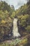 Bushkill Falls in Poconos, PA, surrounded by lush fall foliage