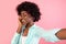 Bushy African American Lady Making Selfie Posing Touching Face, Pink Background