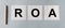 Business Acronym ROA, Return on assets. white papers with silver pen on blue table flatly, banner, top view