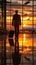 Business airport concept Silhouettes of a businessman with his suitcase, waiting for a plane