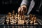 Business analogy Hand engages chessboard, symbolizing calculated planning and strategic comparisons