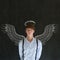 Business angel investor man with chalk wings and halo