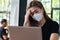 Business Asian young woman working with computer laptop and wearing protection mask coughing have fever and illness be congested w