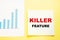 Business caption on the Killer feature graph denoting the killer quality of a startup`s product or service, which gives a great