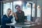 Business colleagues making a fist bump at office