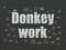 Business concept: Donkey Work on wall background