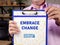 Business concept about EMBRACE CHANGE with sign on the page