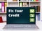 Business concept about Fix Your Credit with phrase on the laptop