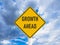 Business concept growth ahead road sign on blue cloudy sky