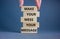 Business concept growth success process. Wood blocks on grey background, copy space. Businessman hand. Words `make your mess your