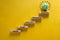 Business concept growth success process. Wood blocks stacking as step stair on yellow background, copy space. Words `vision, plan