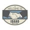Business concept with handshake and the text Welcome to Idaho, U