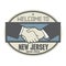 Business concept with handshake and the text Welcome to New Jersey, United States