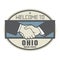 Business concept with handshake and the text Welcome to Ohio, Un