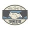 Business concept with handshake and the text Welcome to Tennessee, United States