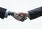 Business concept of Human and robot hands with handshake