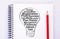 Business Concept - Light bulb drawn on a notepad