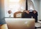 Business concept, man standing at desk with briefcase